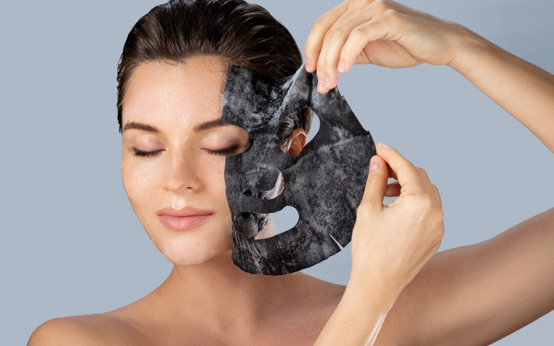 Woman removing bubble sheet mask from her face